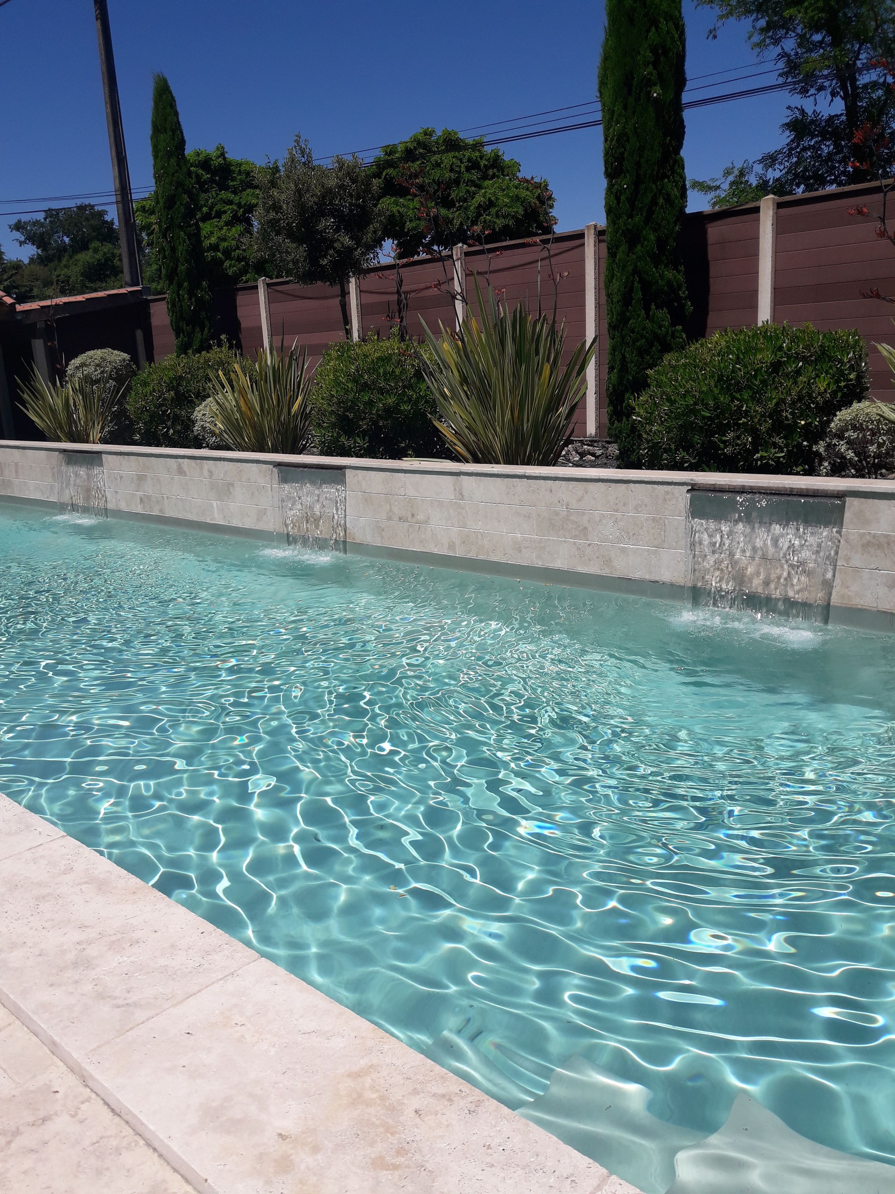 seasonal outdoor pool, open 8 am to 8 pm, pool loungers