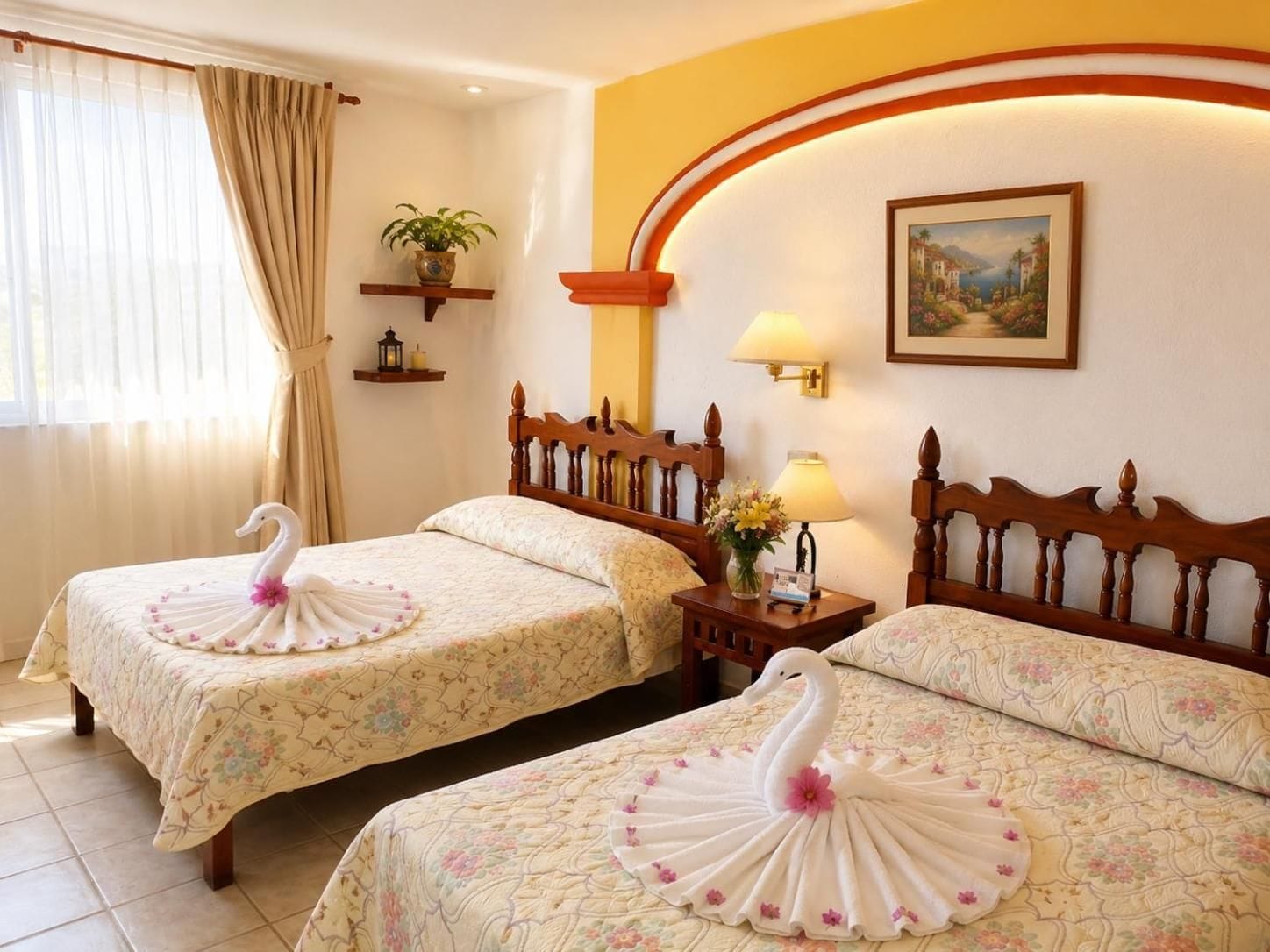 A hotel room with two beds, each with a swan-shaped towel, a nightstand with a lamp, a wall-mounted shelf with a plant, and a painting on the wall.
