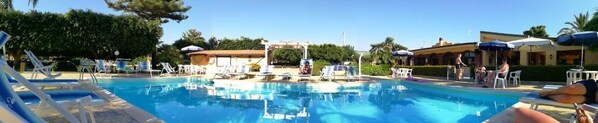 Seasonal outdoor pool, pool umbrellas, sun loungers