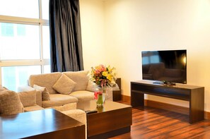Superior Suite | Living room | LED TV, fireplace - Blaire Executive Suites (Manama)