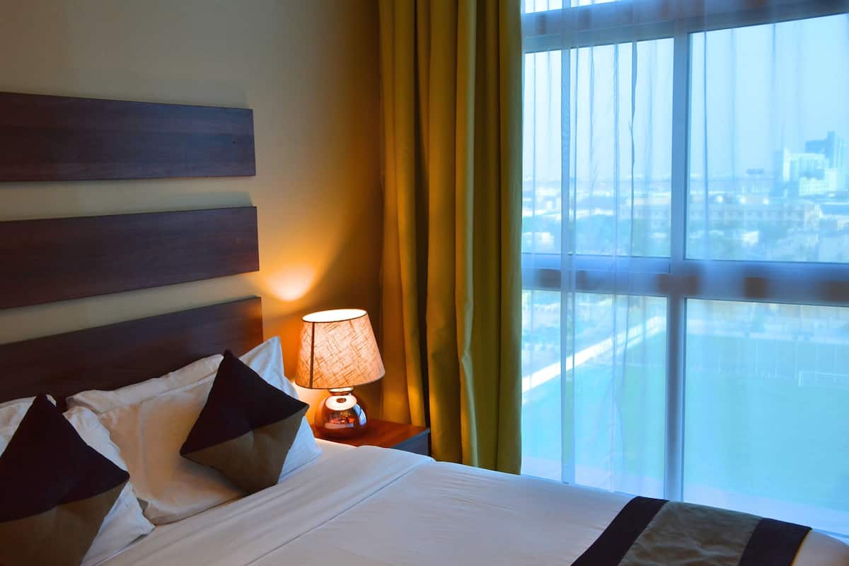 Apartment, 2 Bedrooms, Partial Ocean View | In-room safe, desk, iron/ironing board (on request), WiFi (free)
