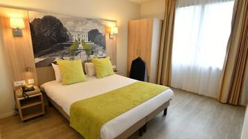 Premium bedding, blackout drapes, soundproofing, iron/ironing board