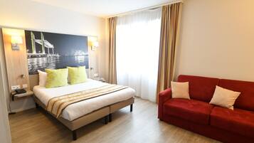 Premium bedding, blackout drapes, soundproofing, iron/ironing board