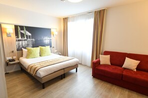 Premium bedding, blackout curtains, soundproofing, iron/ironing board