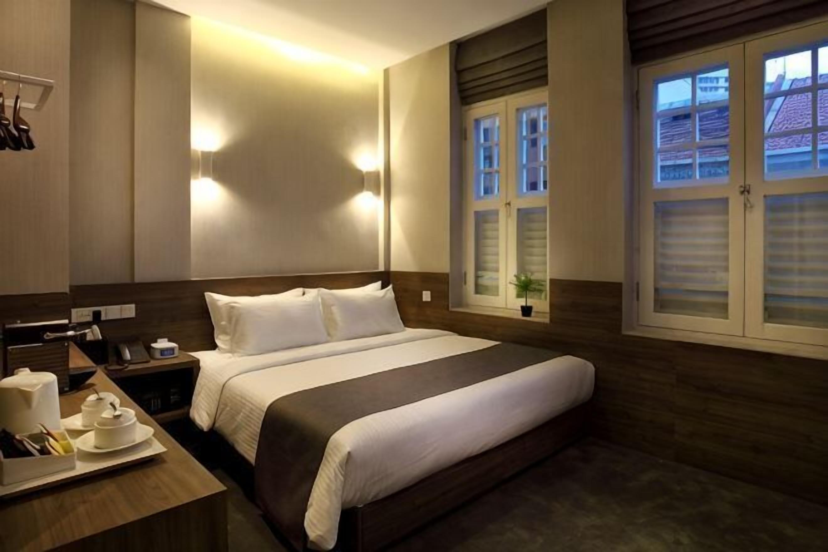 Ropa de cama de alta calidad y minibar 