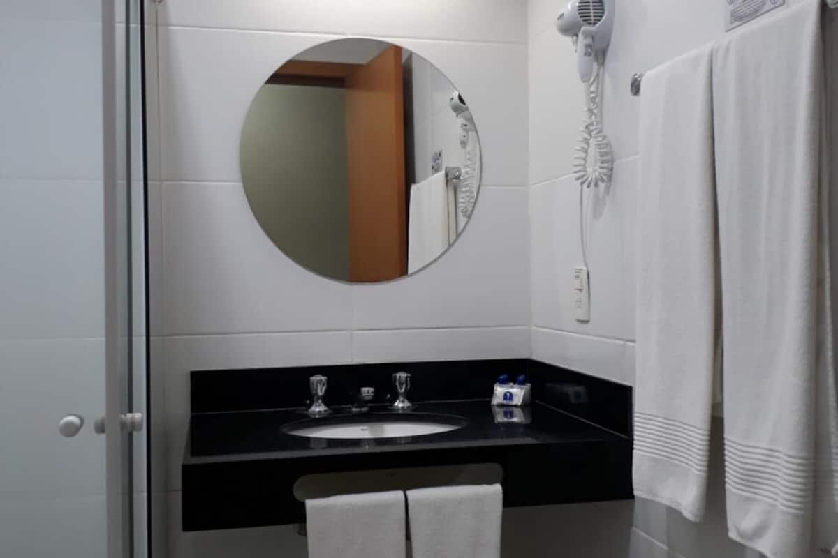 twin room, 2 single beds | bathroom | shower, towels