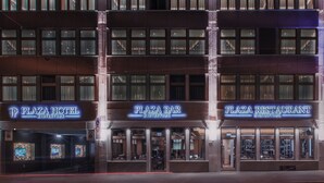 A multi-story building with 'Plaza Hotel' and 'Plaza Bar' signs, featuring large windows and a modern facade. - Plaza Hotel (Winterthur)