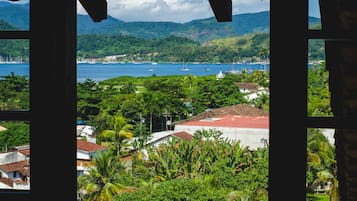 Quarto casal luxo | Vista para praia/oceano