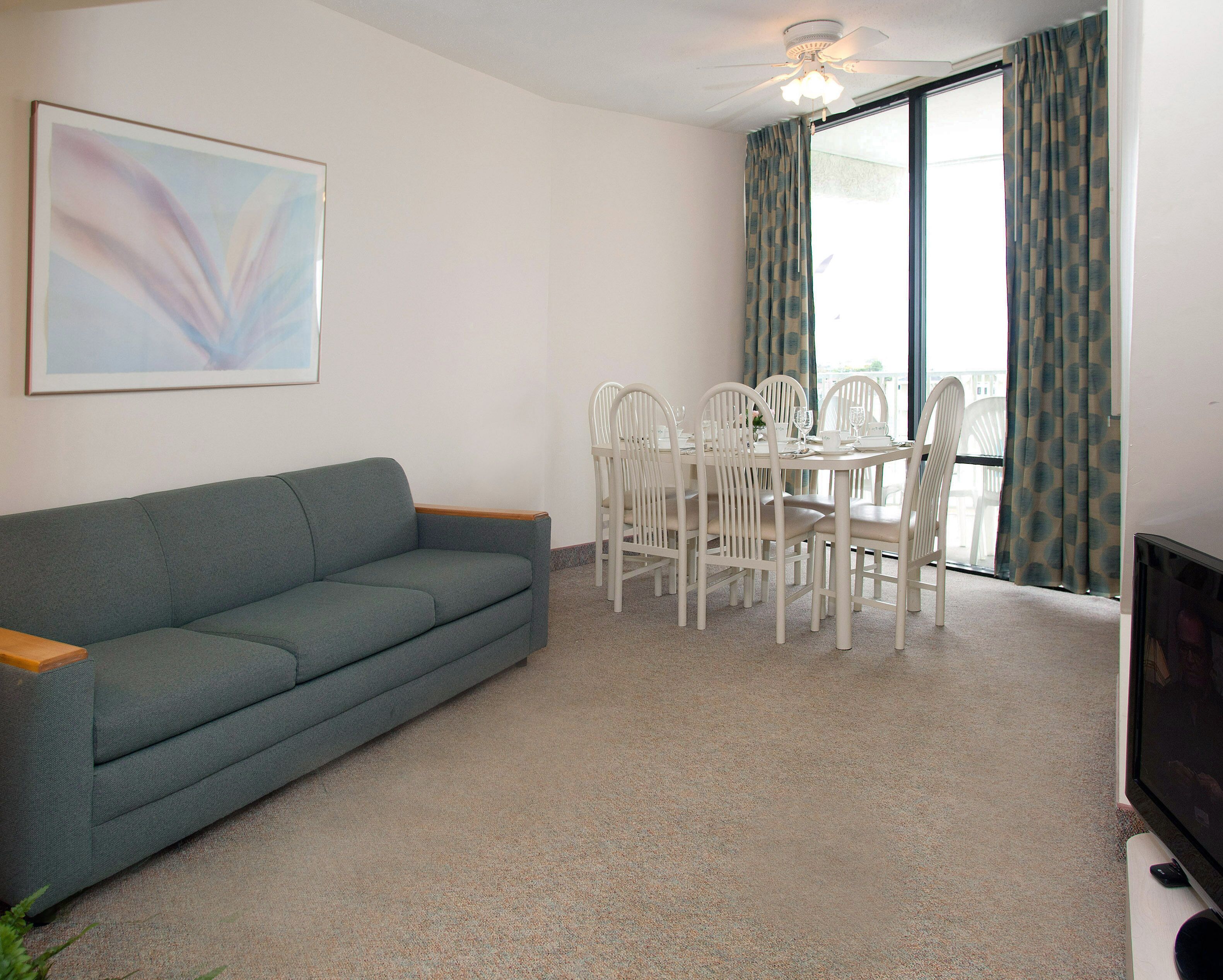 family townhome, 3 bedrooms, partial ocean view (g3) | living area | flat-screen tv