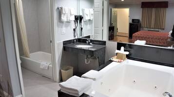 Standard Room, 1 King Bed, Jetted Tub | Deep soaking bathtub