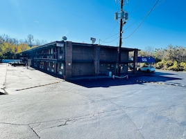 A two-story building with a sign reading "Cumberland Inn."