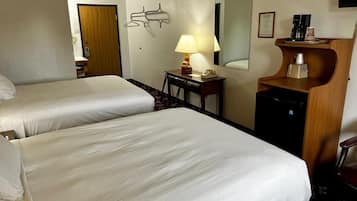 Roupas de cama premium, escrivaninha, Wi-Fi de cortesia, roupa de cama