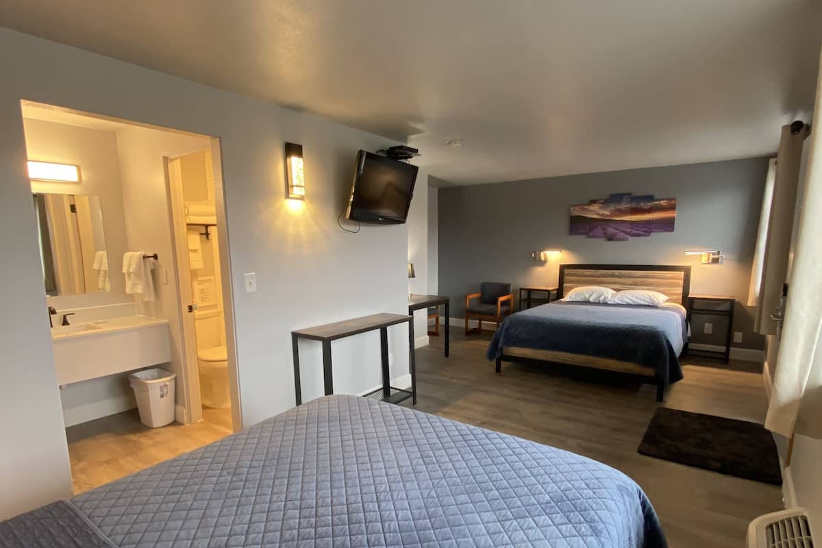 Room, 2 Queen Beds | Individually decorated, individually furnished, desk, free WiFi