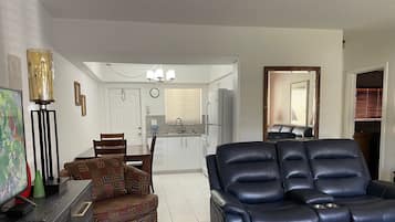 Superior Apartment | Living area | Flat-screen TV