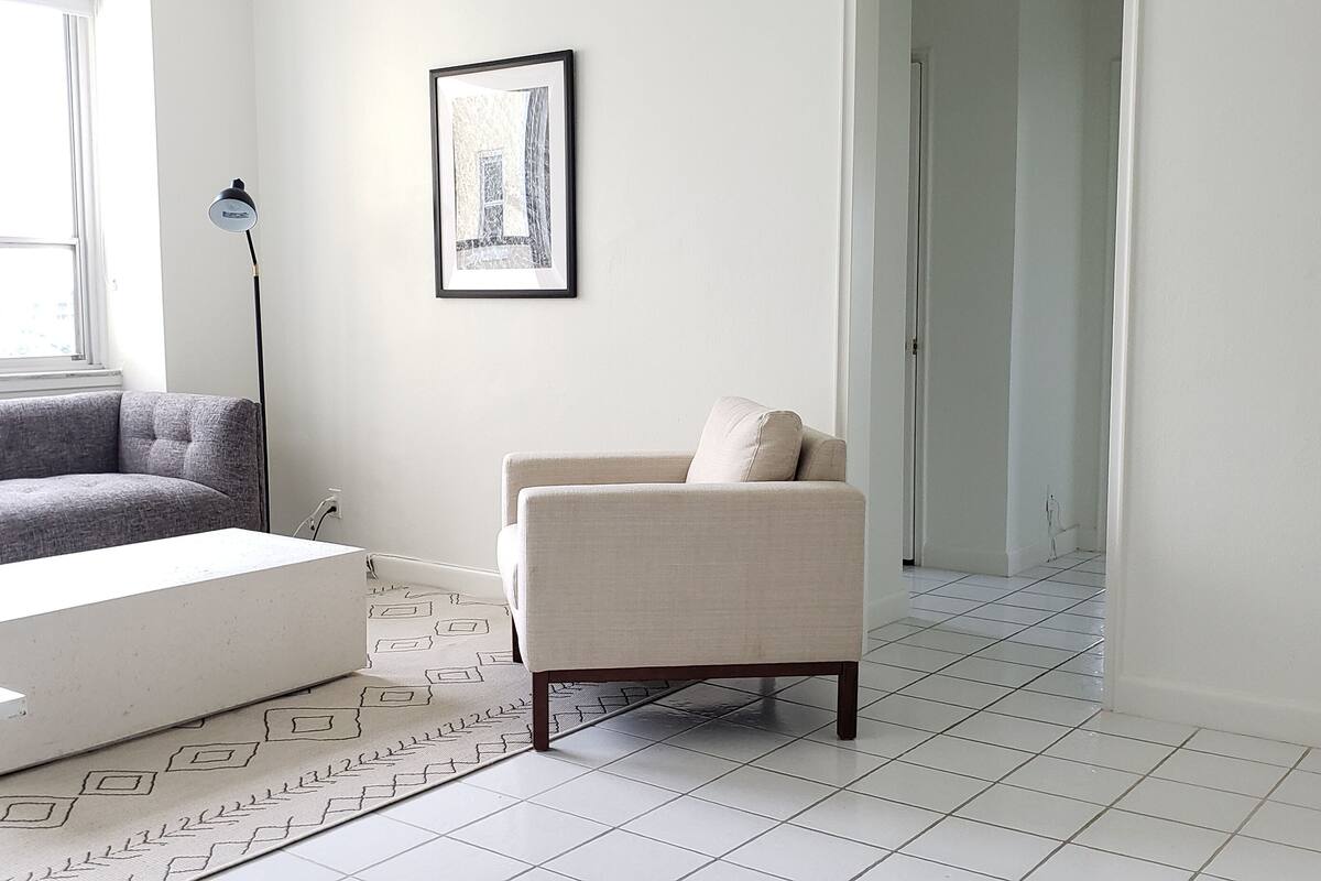 Signature Apartment, 1 King Bed, Pool View | Living area | 42-inch flat-screen TV with cable channels, TV
