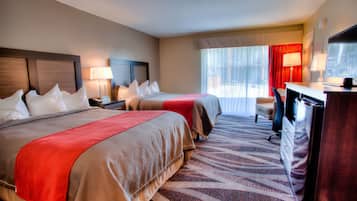 Desk, laptop workspace, blackout drapes, iron/ironing board