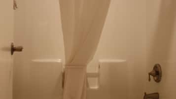 Combined shower/bathtub, hair dryer, towels, soap