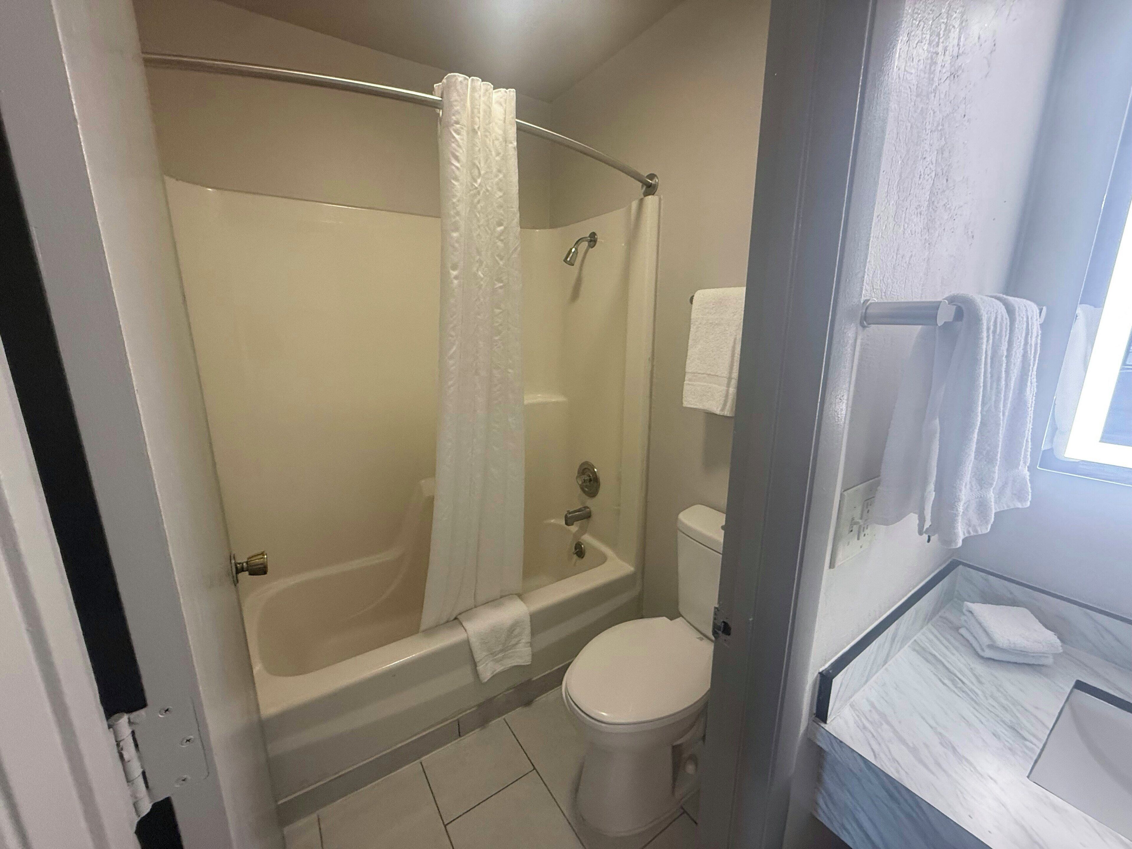 Combined shower/tub, free toiletries, towels, soap