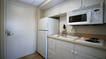 Fridge, microwave, stovetop, coffee/tea maker