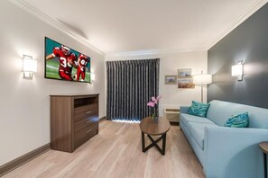 Luxury Suite, Multiple Beds, Balcony (Smoke Free) | Living area | 43-inch flat-screen TV with cable channels, TV