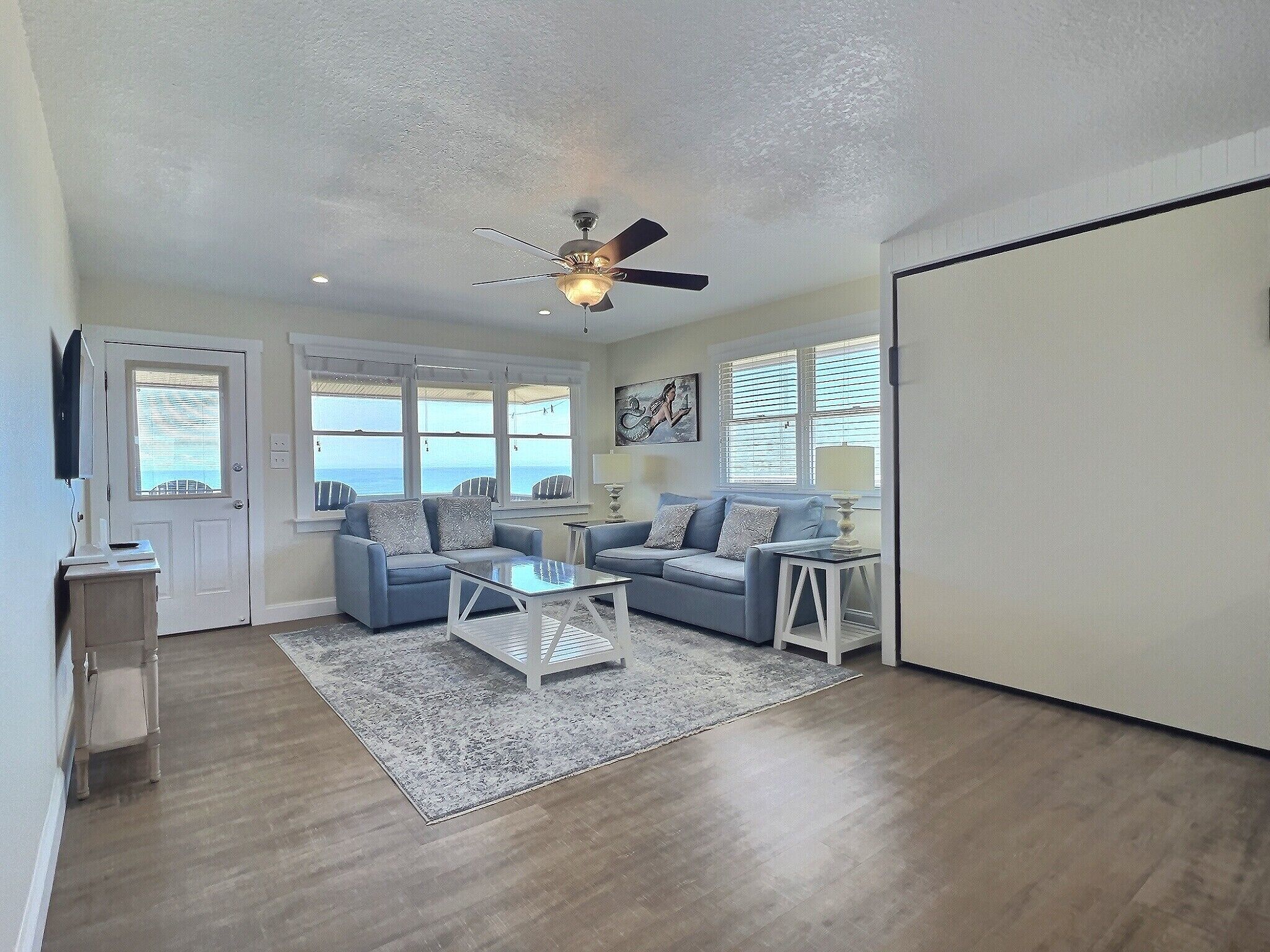 superior suite, multiple beds, ocean view, executive level | living area | 42-inch flat-screen tv with digital channels, tv, hulu