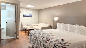 Suite, 1 letto king, non fumatori | Una scrivania, Wi-Fi gratuito, lenzuola