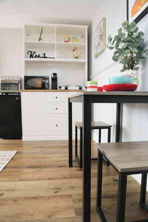Ropa de cama de alta calidad y tabla de planchar con plancha
