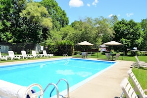 Seasonal outdoor pool, open 9 AM to 8 PM, pool umbrellas, sun loungers