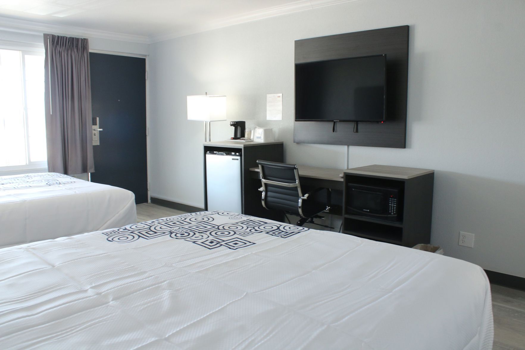 Blackout drapes, soundproofing, free WiFi, bed sheets