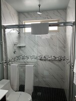 Shower, free toiletries, towels, soap