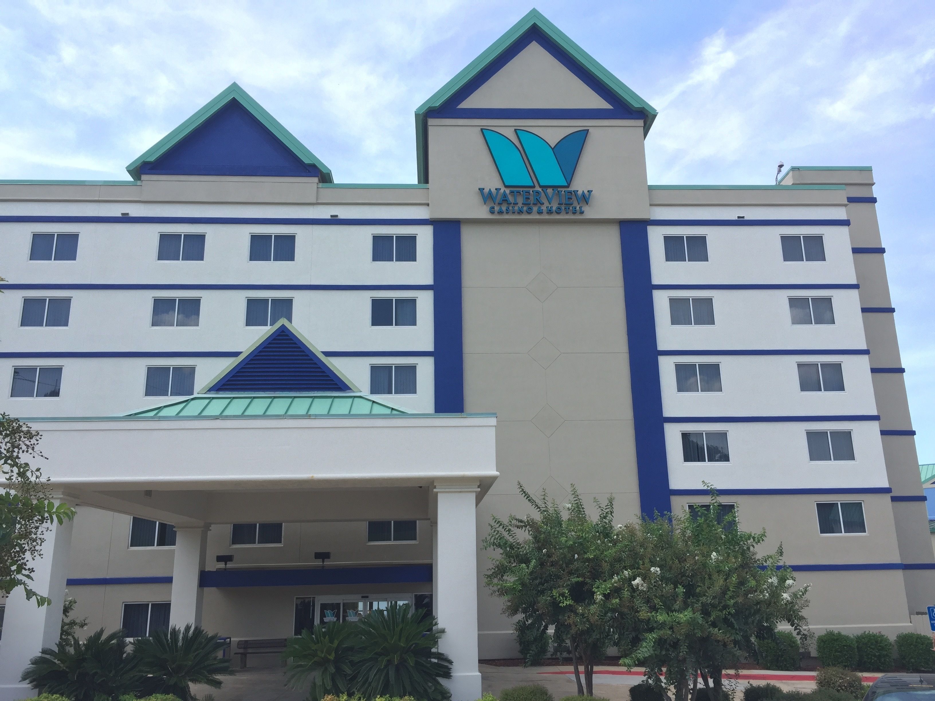 A multi-story hotel with a prominent 'Waterview Casino & Hotel' sign.