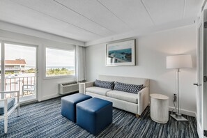 Signature Suite | Living area | 1-inch flat-screen TV with cable channels, TV