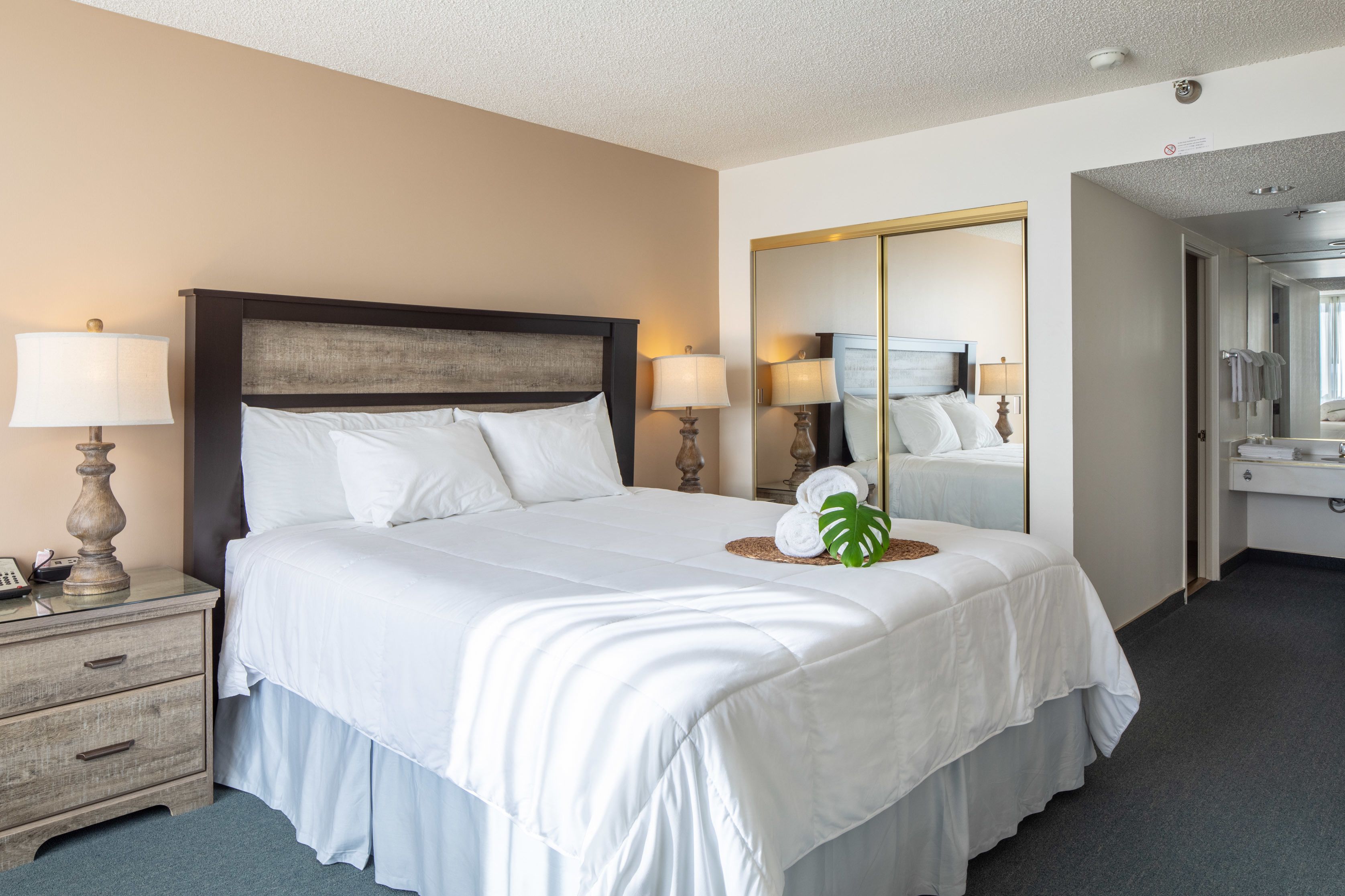 desk, laptop workspace, blackout curtains, iron/ironing board