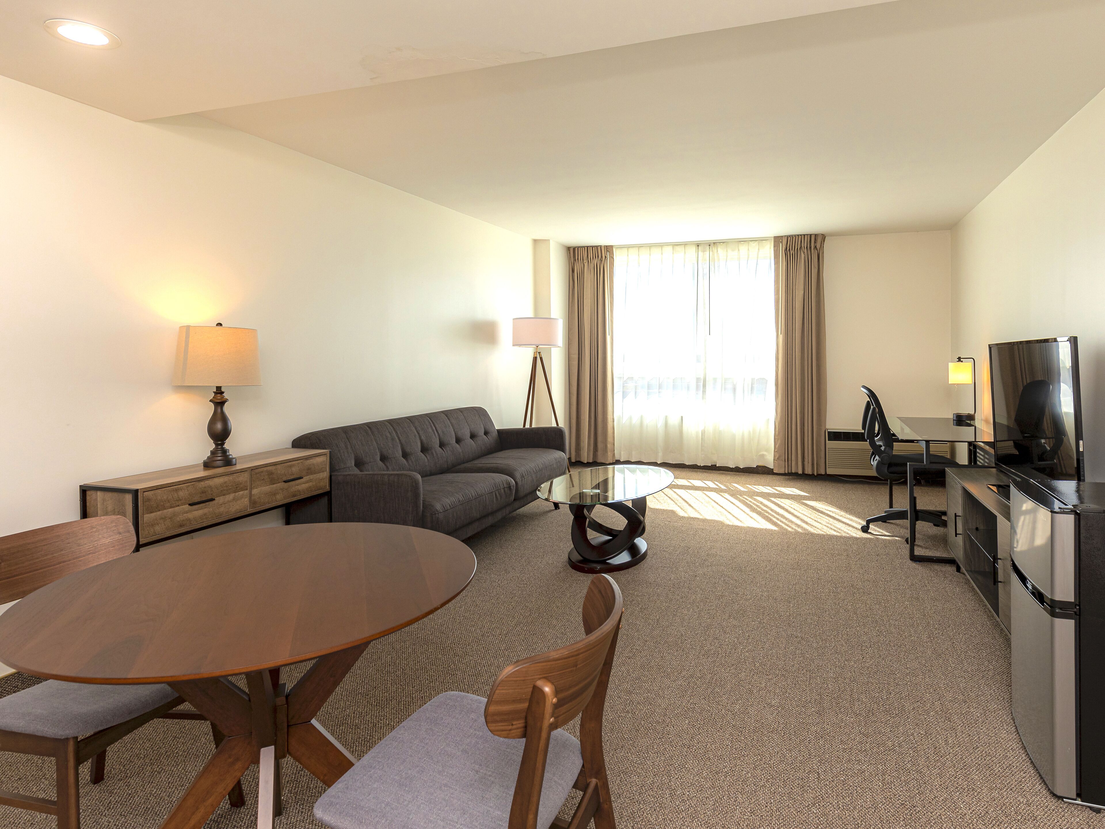 desk, laptop workspace, blackout curtains, iron/ironing board