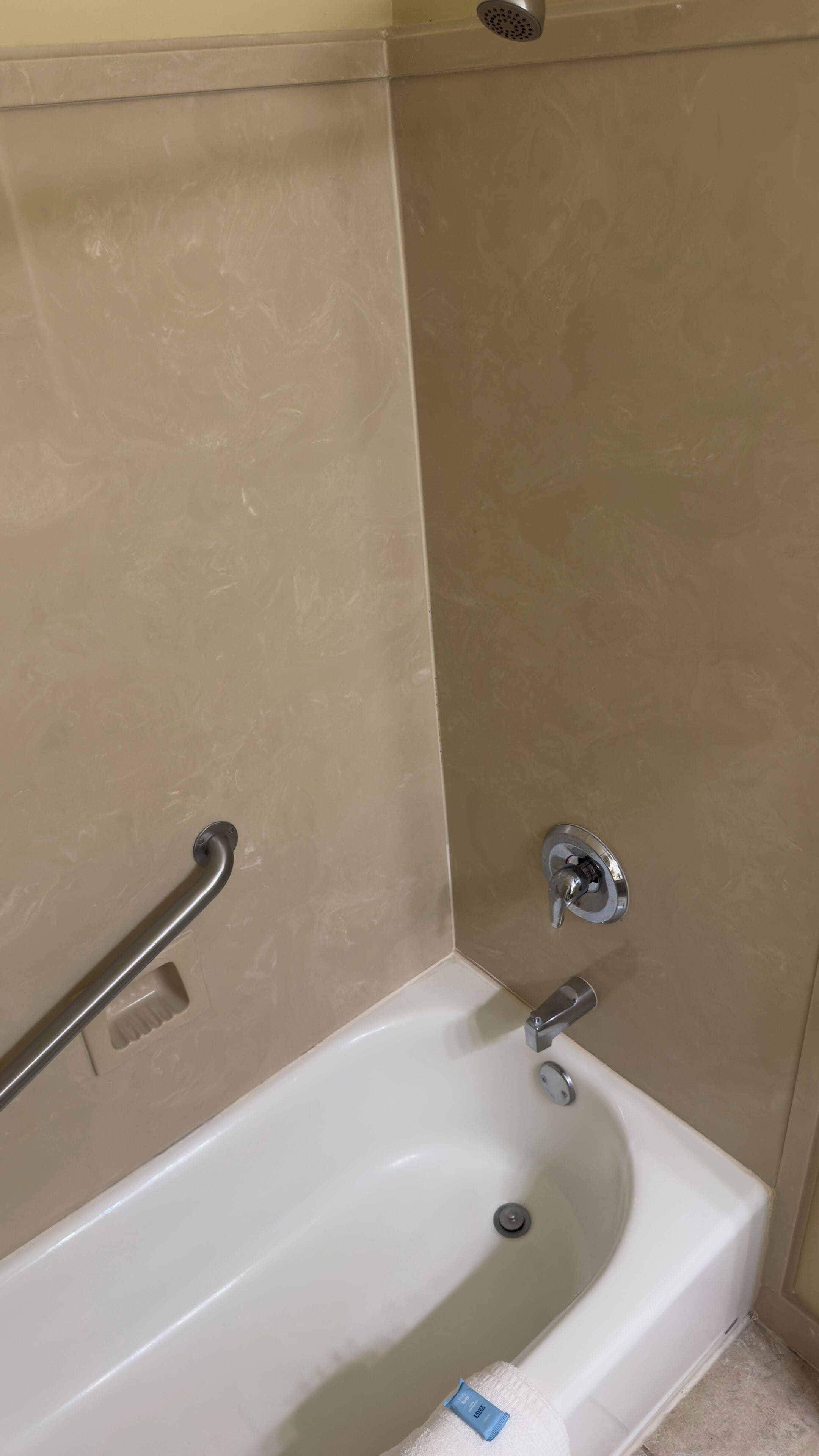 combined shower/bathtub, free toiletries, hair dryer, towels