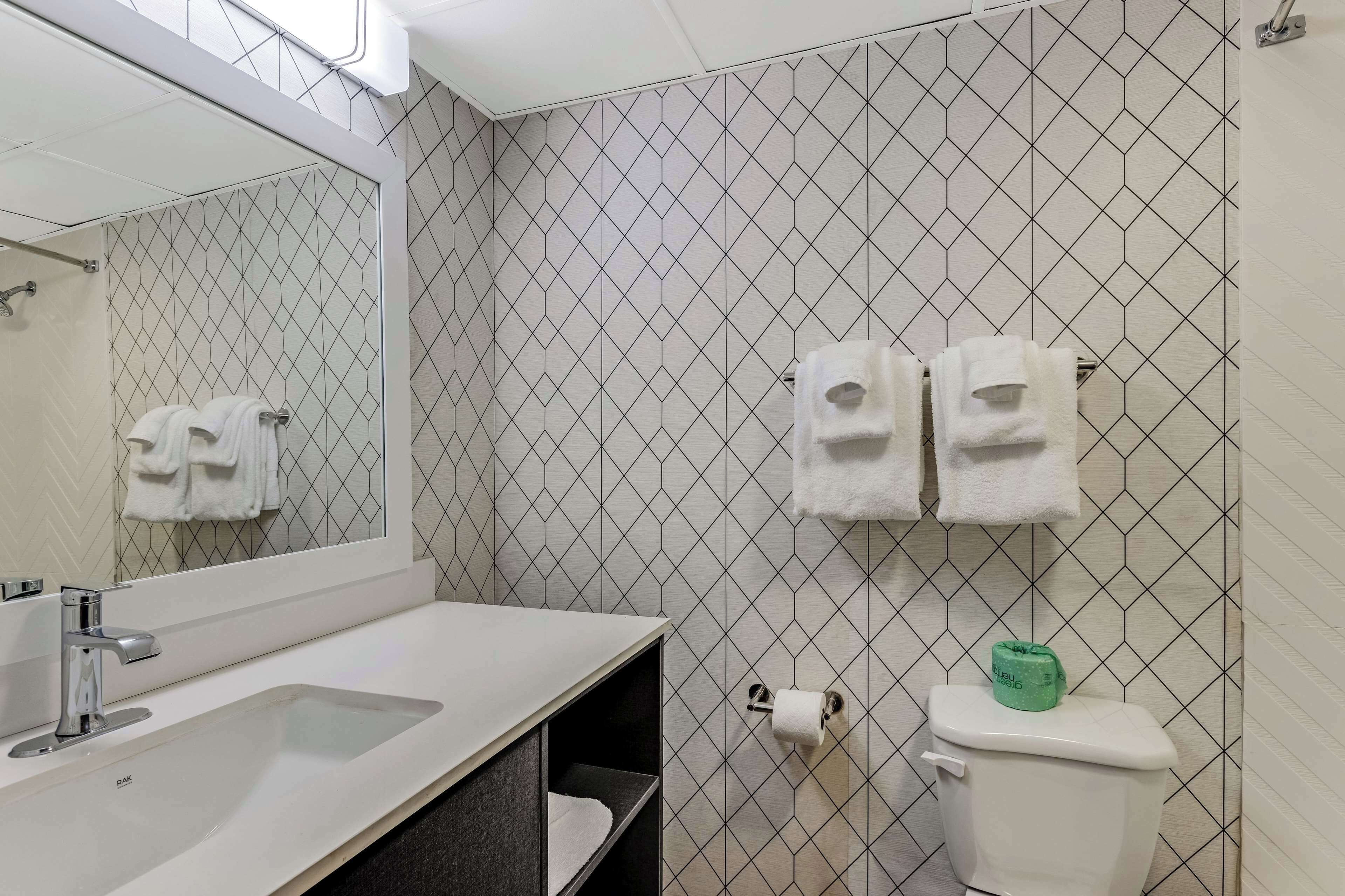 Deluxe Room, 2 Queen Beds, Non Smoking (1-Bedroom) | Bathroom | Free toiletries, hair dryer, towels