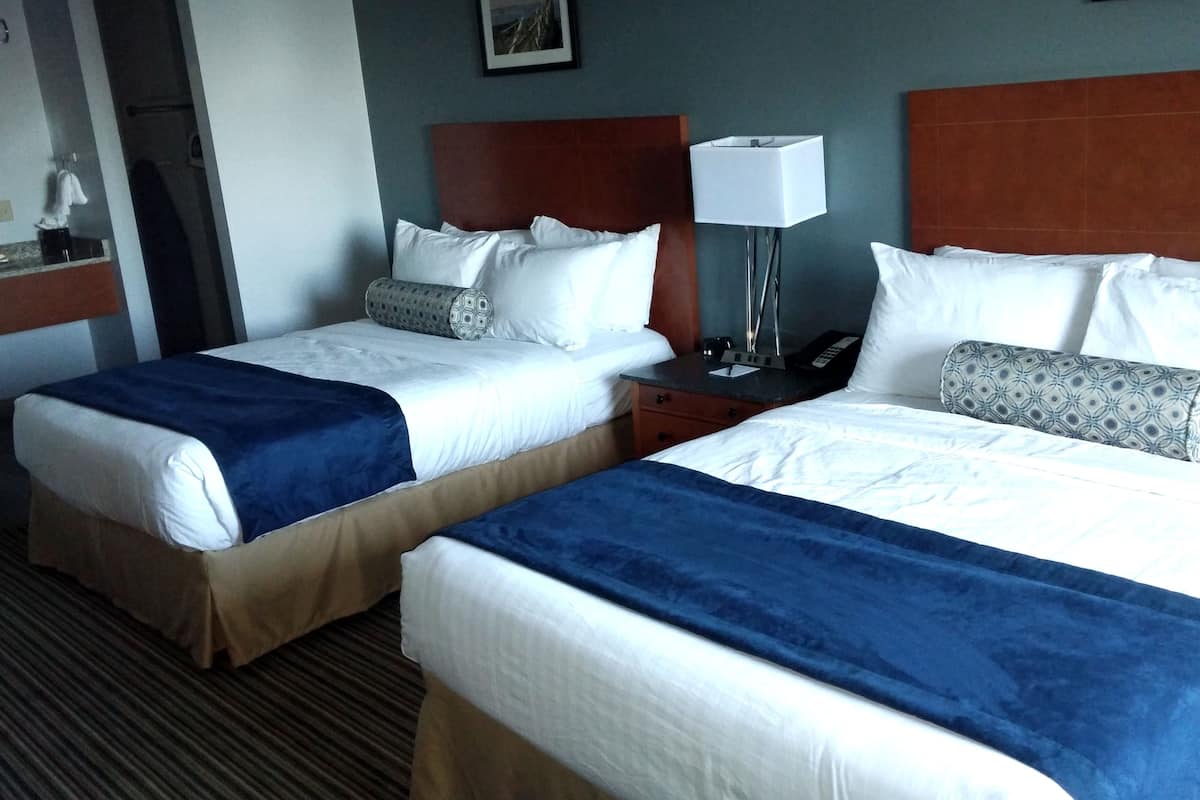 economy room, 2 queen beds | desk, iron/ironing board, free wifi, bed sheets