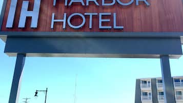 A large sign for Rockland Harbor Hotel with a modern design.