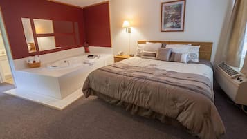 Room, 1 King Bed, Jetted Tub | Blackout curtains, iron/ironing board, free WiFi, bed sheets