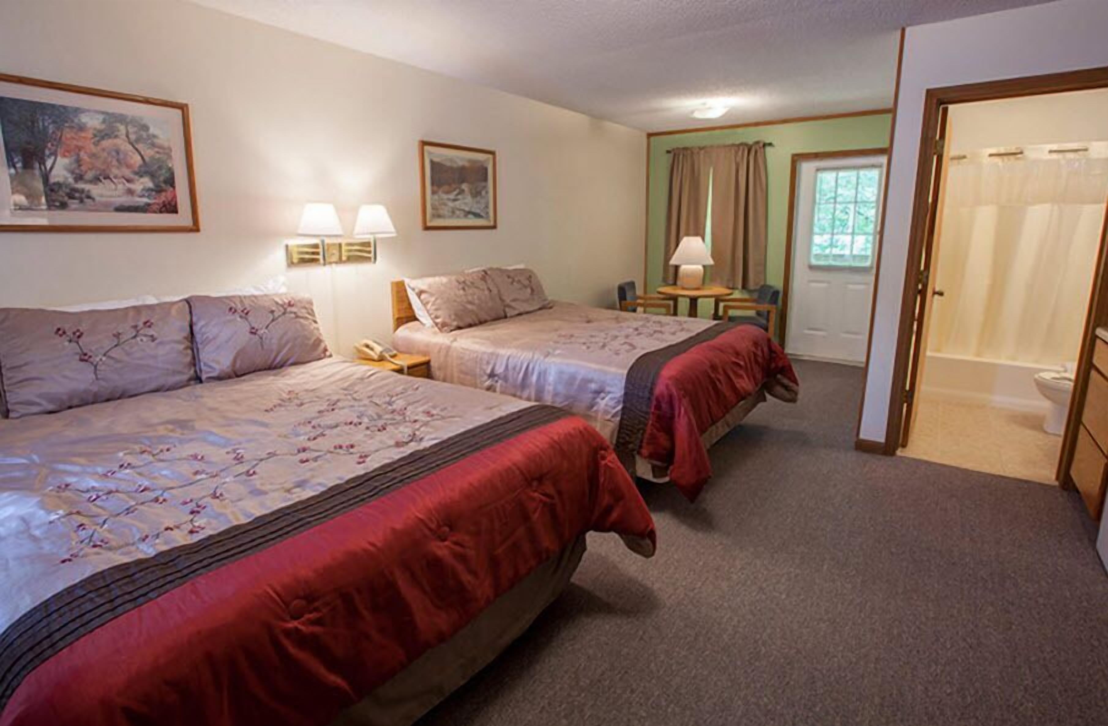 room, 2 queen beds, balcony | blackout curtains, iron/ironing board, free wifi, bed sheets