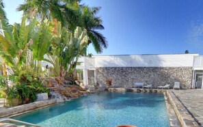 Outdoor pool, open 8:00 AM to 8:00 PM, pool umbrellas, pool loungers