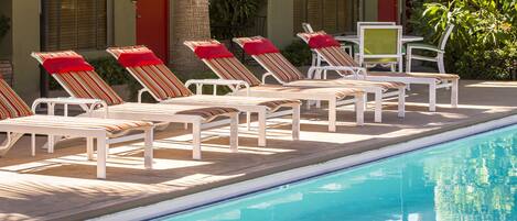 Outdoor pool, pool umbrellas, sun loungers