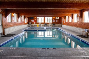 Indoor pool, open 9:00 AM to 9:00 PM, pool umbrellas, sun loungers