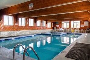 Indoor pool, open 9:00 AM to 9:00 PM, pool umbrellas, sun loungers