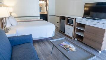 King Bed w/ Partial View | Egyptian cotton sheets, premium bedding, desk, iron/ironing board