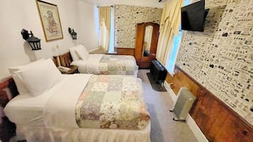 Economy Twin Room, Shared Bathroom | Blackout drapes, free WiFi, bed sheets