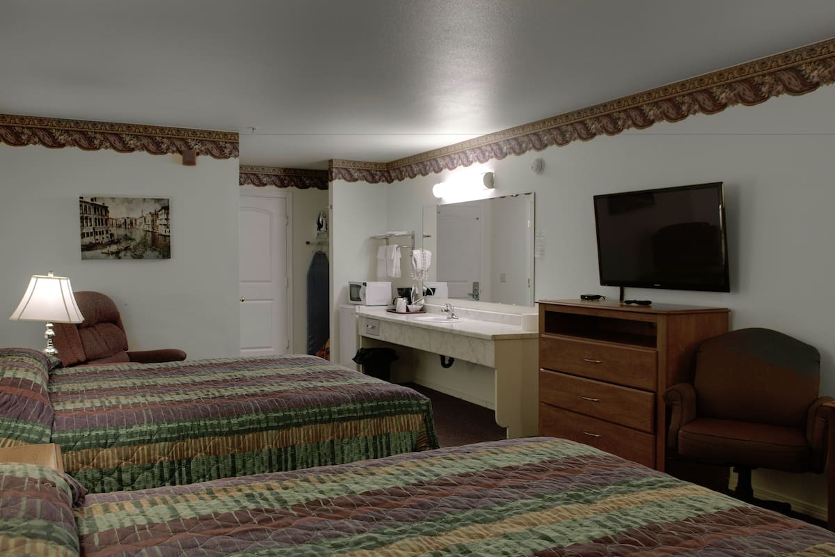 standard room, 2 queen beds | pillow-top beds, desk, blackout curtains, iron/ironing board