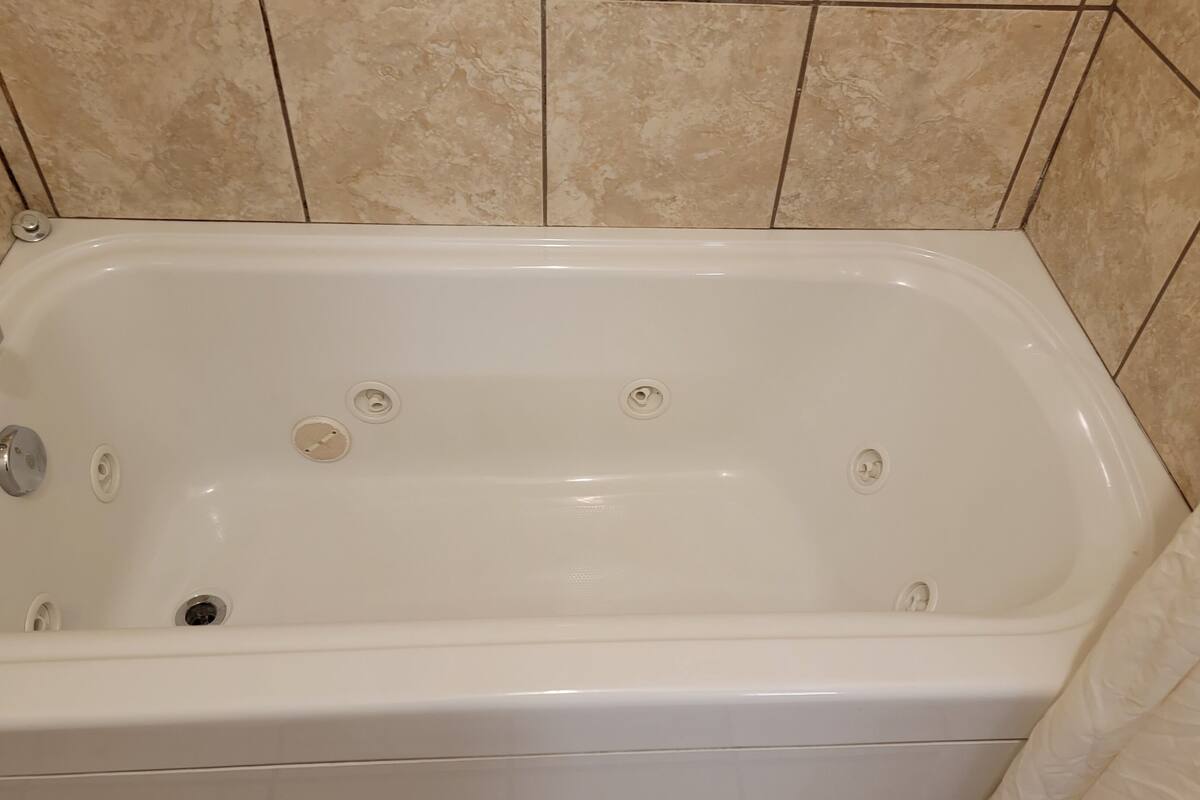 deluxe room, 2 queen beds | bathroom | free toiletries, hair dryer, towels, soap