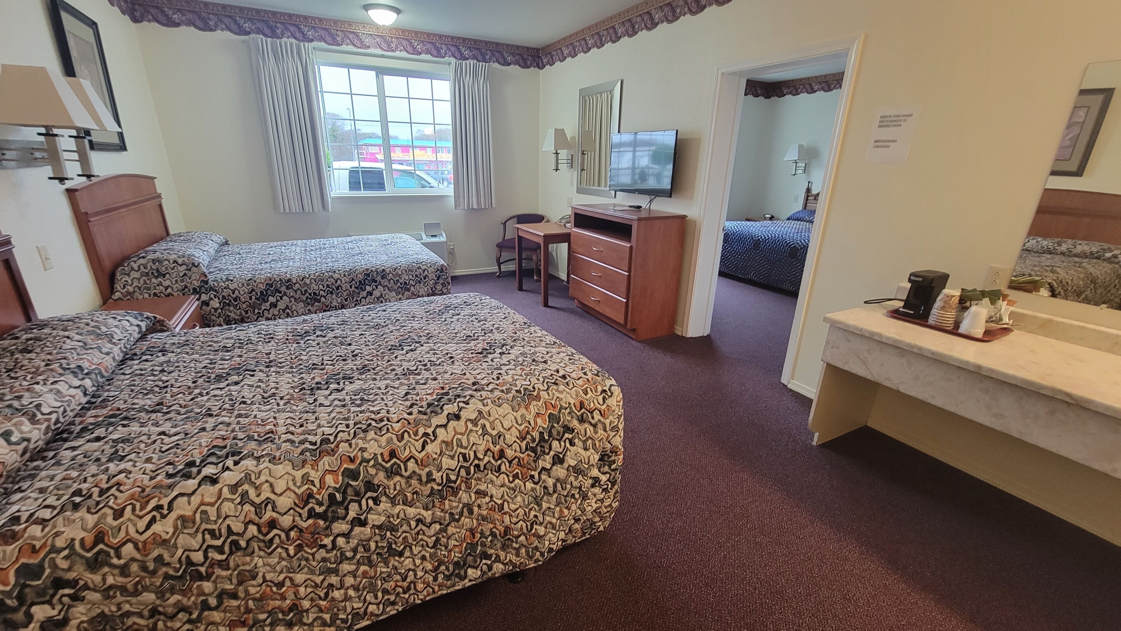 suite, 2 bedrooms | pillow-top beds, desk, blackout curtains, iron/ironing board