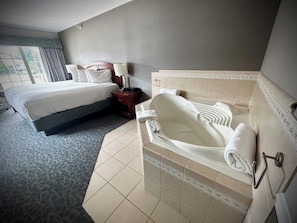 Luxury Suite, 1 King Bed, Jacuzzi and Fireplace | Soundproofing, iron/ironing board, cribs/infant beds, rollaway beds - Golden Gables Inn (North Conway)